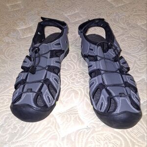 A pair of Coleman George sandals in a men's size 13M. They're in excellent shape